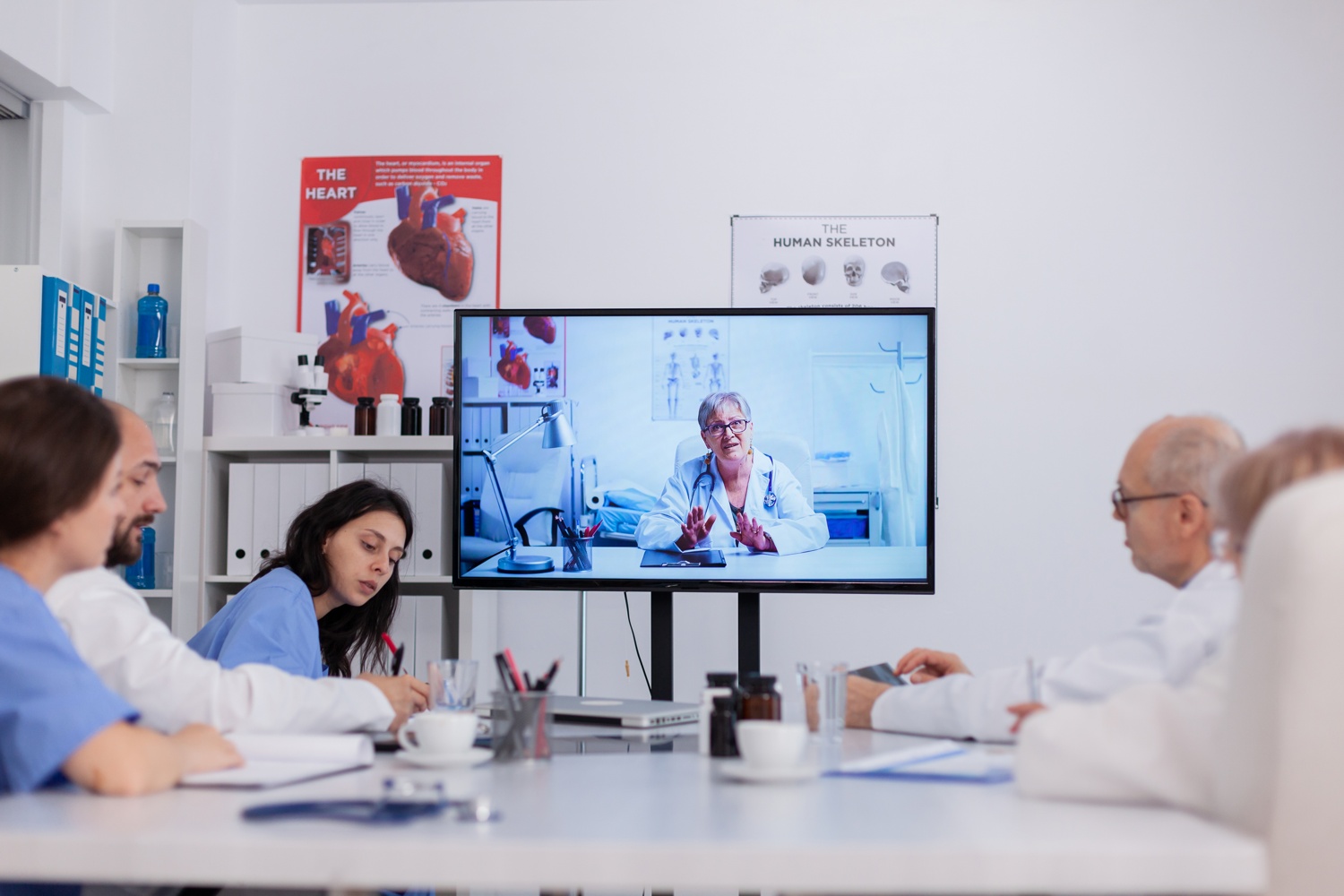 teamwork-discussing-sickness-treatment-online-videocall-telemedicine-teleconference-working-meeting-room