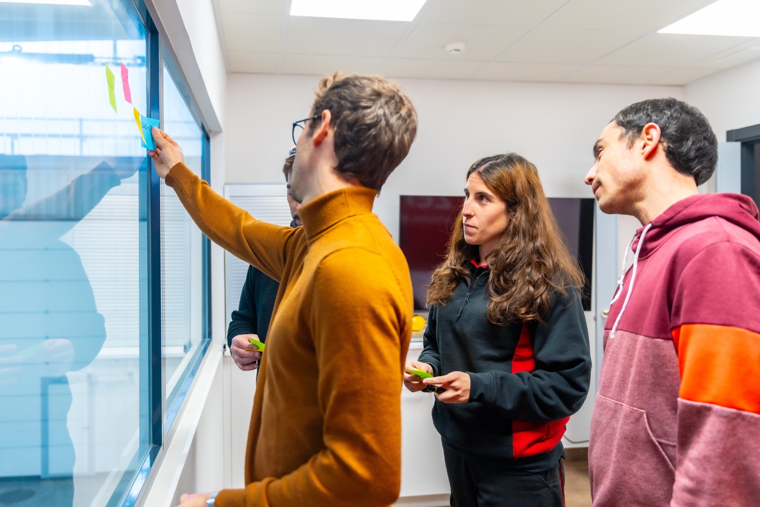 Cnc engineers work team using notes during a brainstorming in a work meeting